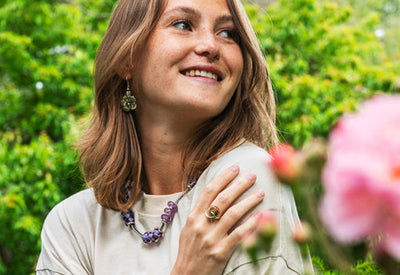 Model at a beach wearing Trollbeads
