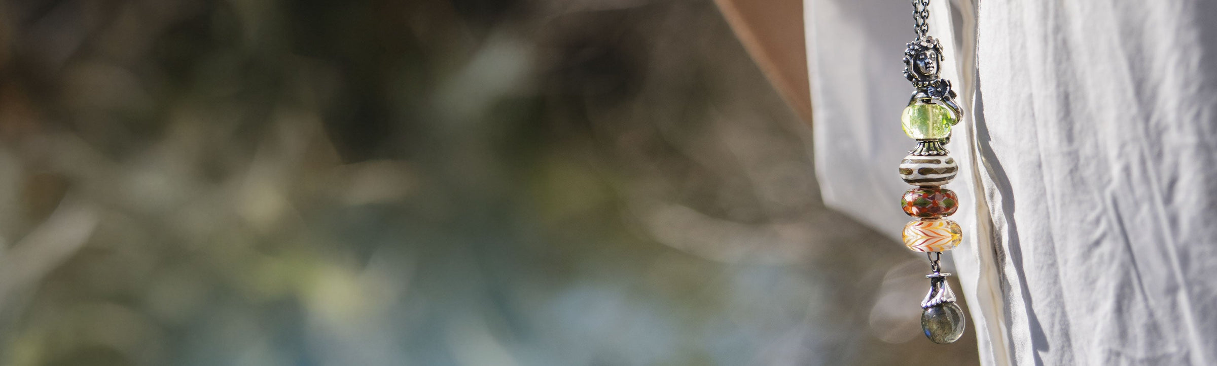 Guardian of Love with Lime Prism glass bead and three glass beads